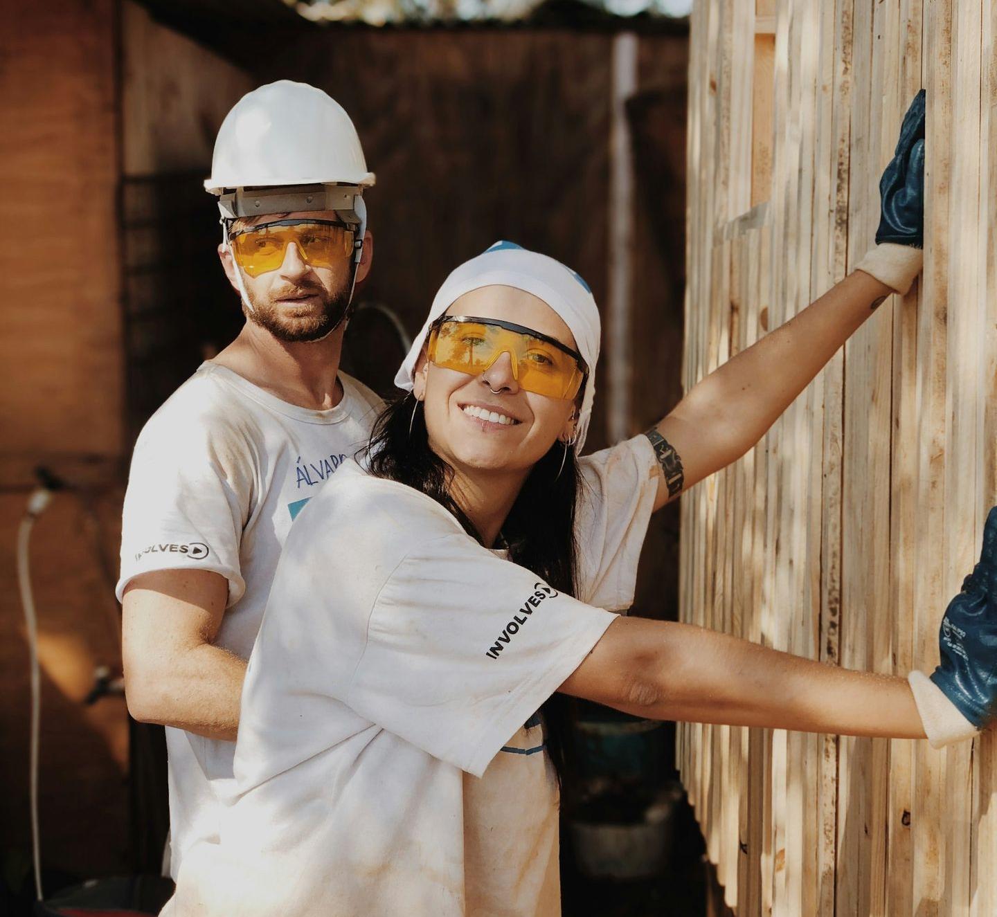 woman in white shirt wearing white helmet