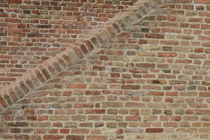a brick wall with a brick wall